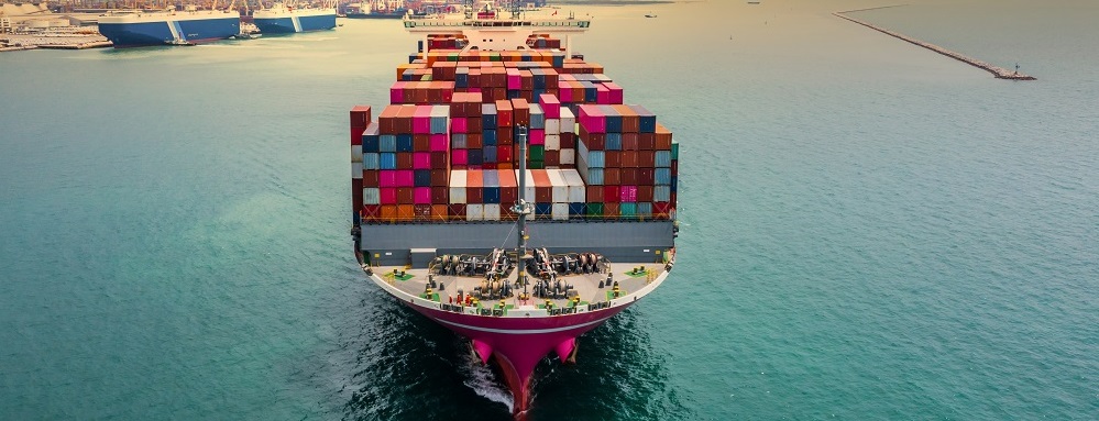 Aerial view container cargo ship, import export commerce business trade logistic and transportation of International by container cargo ship boat in the open sea, Freight shipping maritime.